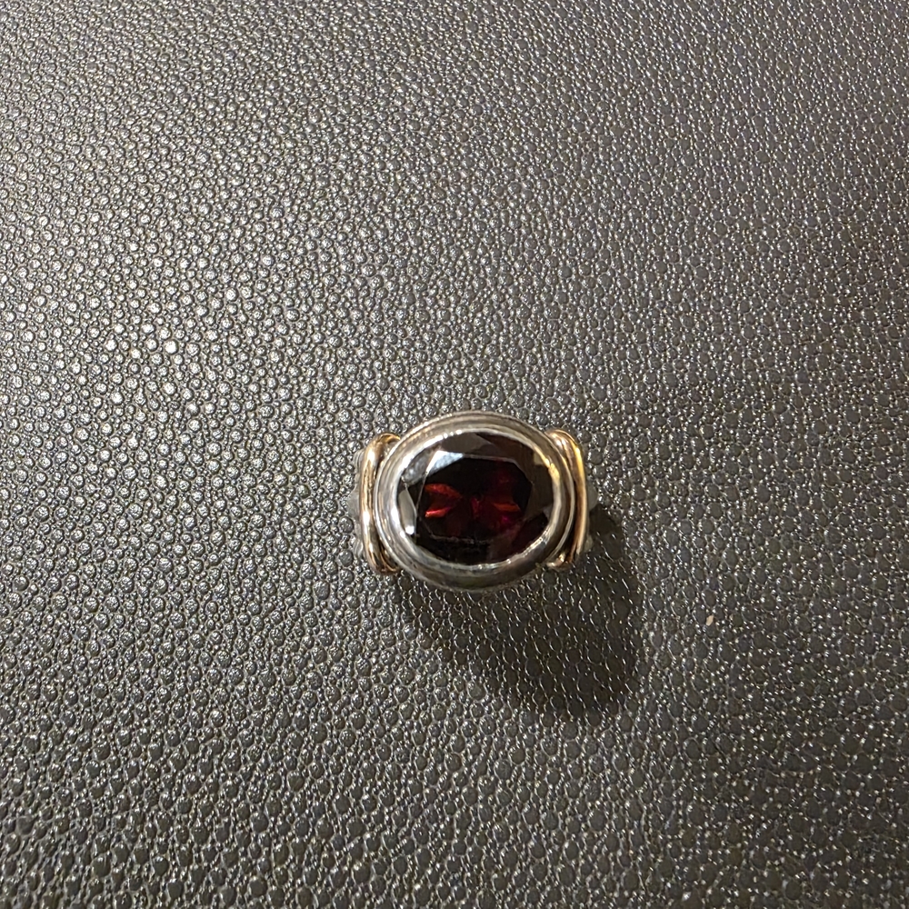 Elegant Gold and Silver Ring with Red Gemstone
